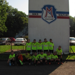 W lidze w ramach akcji „Lato z MOSiR-em 2014” wygrał Mazur Gostynin w składzie Patryk Gronalewski, Bartosz Majewski, Dominik Staniszewski, Dariusz Kurkowski, Eryk Wydrzyński, Mateusz Ostrowski i Eryk Przybylski przed zespołem FC Koksy i Tigery Gostynin.