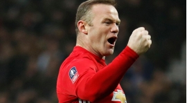 Rooney historisk när United krossade Reading